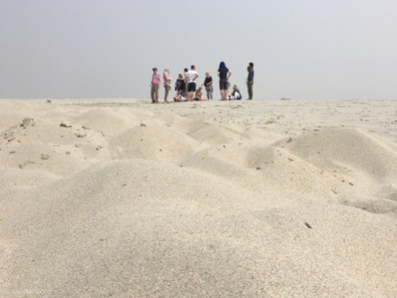 break on a sandbank with a field of sand bags